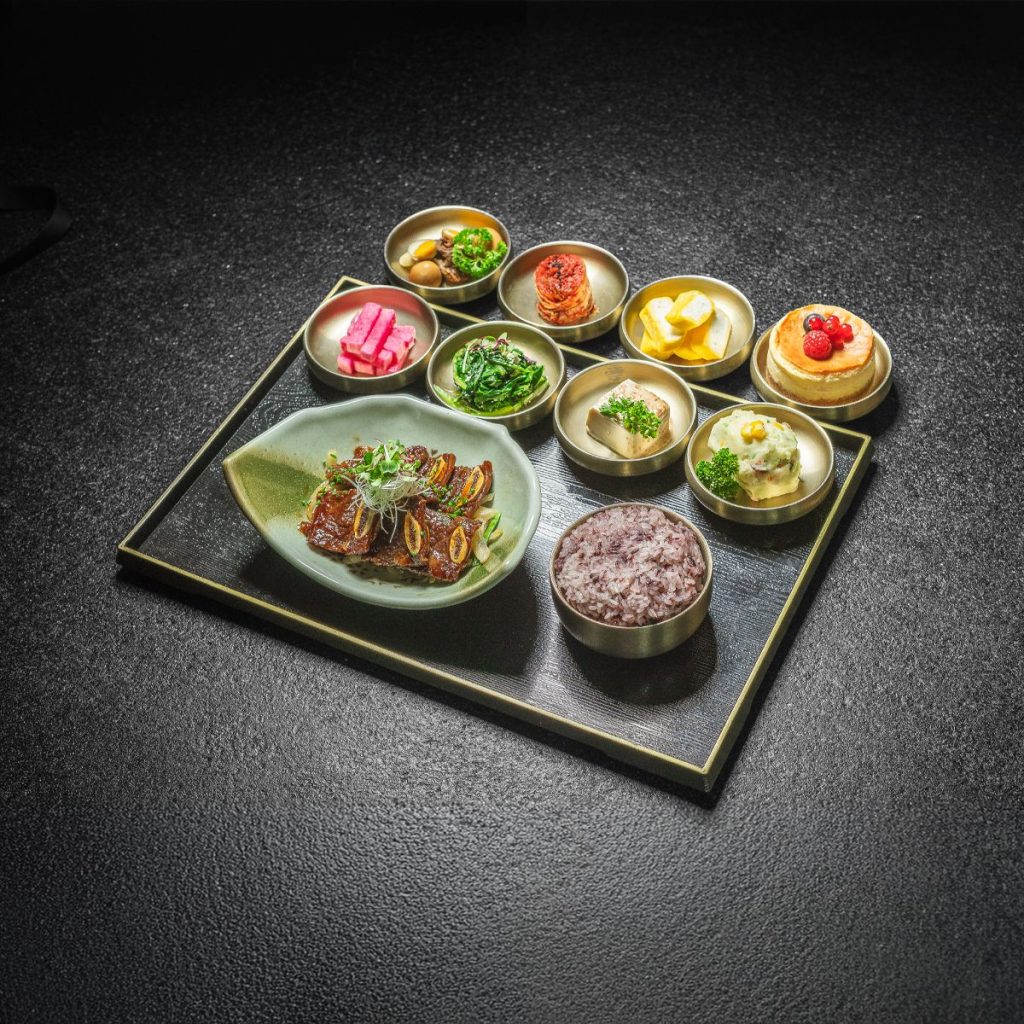 Korean set meal tray from NURI Grill & Bar: braised beef, purple rice and side dishes